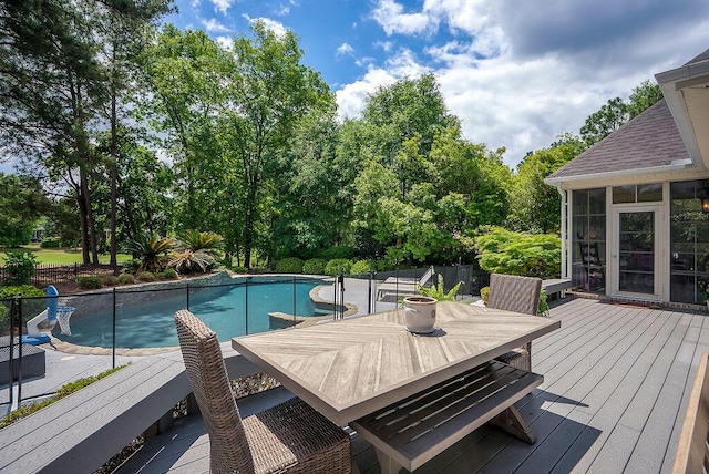 153 Longwood Green Ct, Aiken, SC 29803 - view of swimming pool featuring a fenced in pool, outdoor dining space, a sunroom, and a deck
