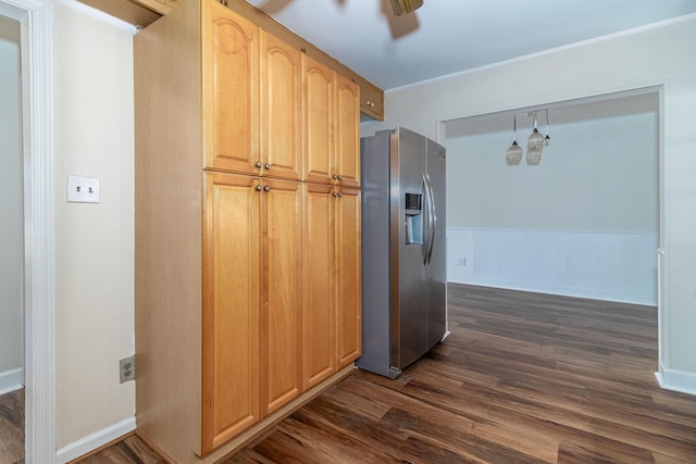 kitchen featuring dark wood finished floors, a ceiling fan, stainless steel refrigerator with ice dispenser, and baseboards