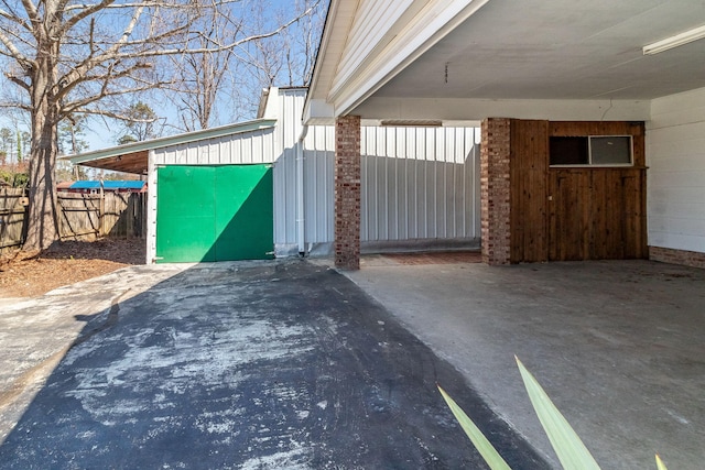 garage with fence