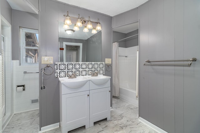 bathroom featuring vanity, visible vents, marble finish floor, and shower / tub combo with curtain