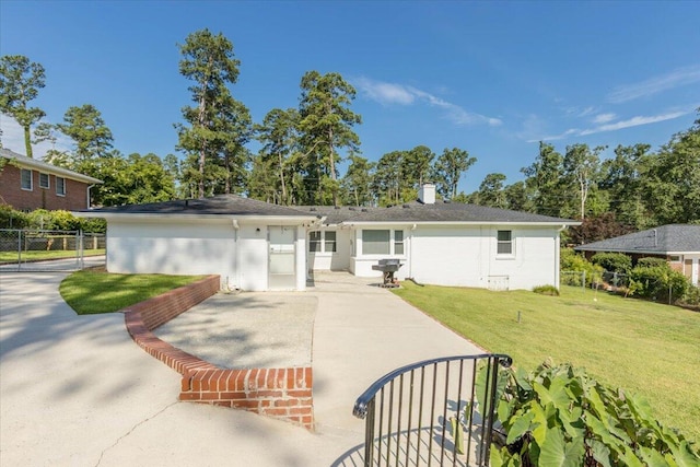 418 Kemp Dr, Augusta, GA 30909 - view of front of home with a gate, a patio area, and a chimney
