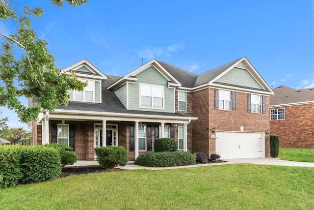 view of front facade featuring a garage and a front lawn