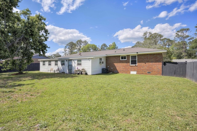 431 Edgar Cir, Thomson, GA 30824 - rear view of property with cooling unit, brick siding, and crawl space