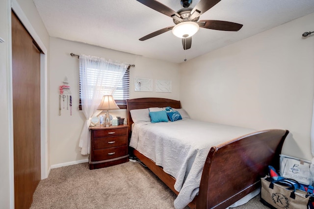 431 Edgar Cir, Thomson, GA 30824 - carpeted bedroom featuring a closet, a ceiling fan, and baseboards