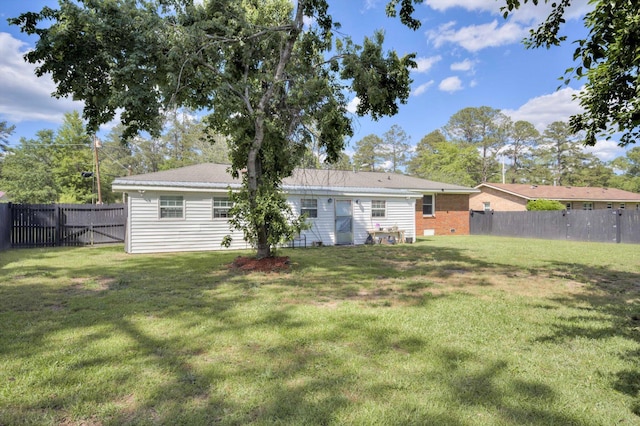 431 Edgar Cir, Thomson, GA 30824 - rear view of house featuring brick siding