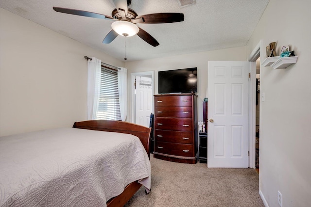 431 Edgar Cir, Thomson, GA 30824 - bedroom featuring light carpet, ceiling fan, and a textured ceiling