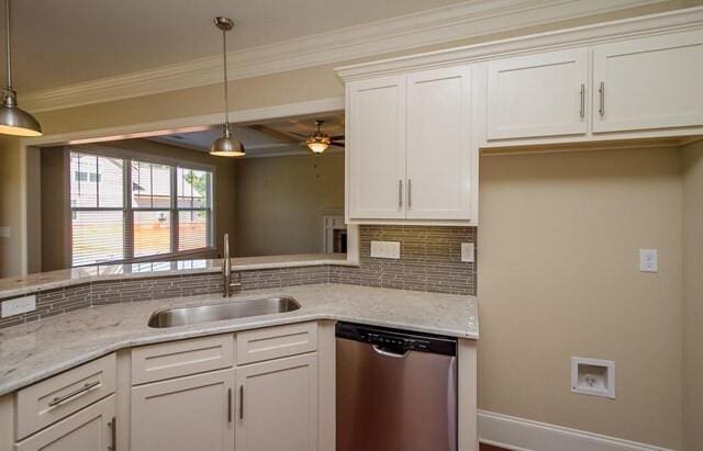 kitchen featuring dishwasher, crown molding, tasteful backsplash, and a sink