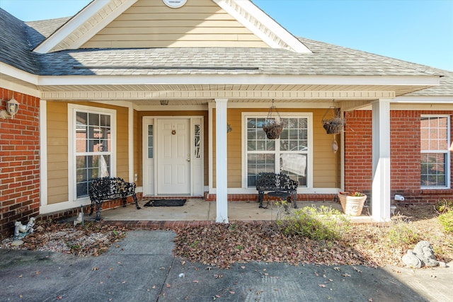 doorway to property featuring a porch