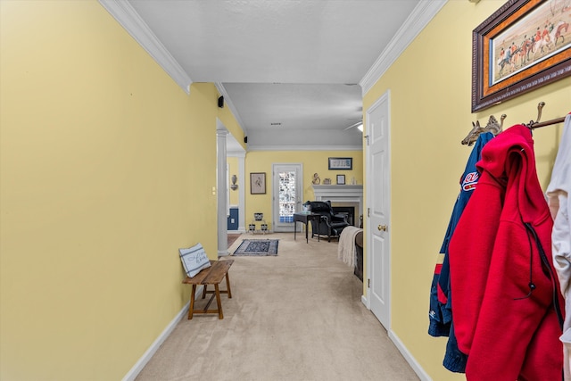 hall with light colored carpet and ornamental molding