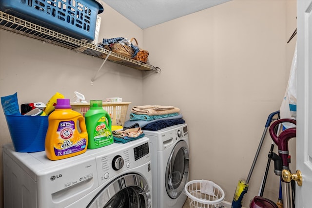 laundry area with washer and clothes dryer