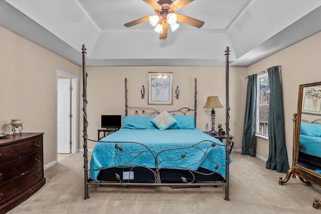 bedroom with ceiling fan, lofted ceiling, and light carpet