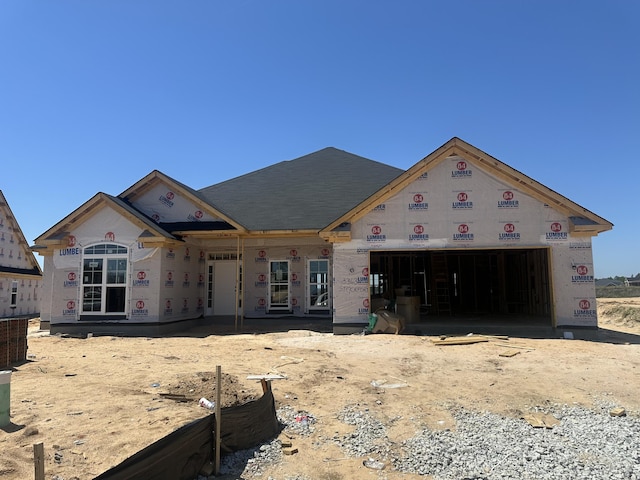 property in mid-construction featuring a garage