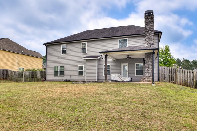 251 Wentworth Pl, Grovetown, GA 30813 - back of property featuring ceiling fan and a chimney