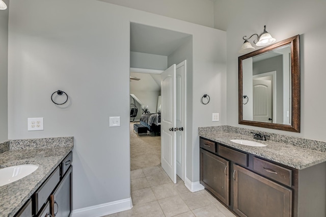 251 Wentworth Pl, Grovetown, GA 30813 - ensuite bathroom with tile patterned flooring, two vanities, and baseboards