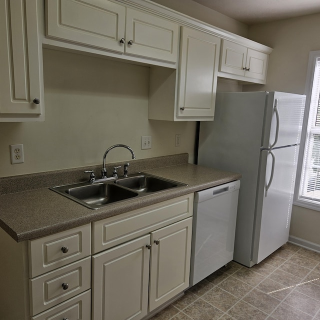 5102 Wheeler Lake Rd, Augusta, GA 30909 - kitchen with white appliances, a sink, and white cabinets