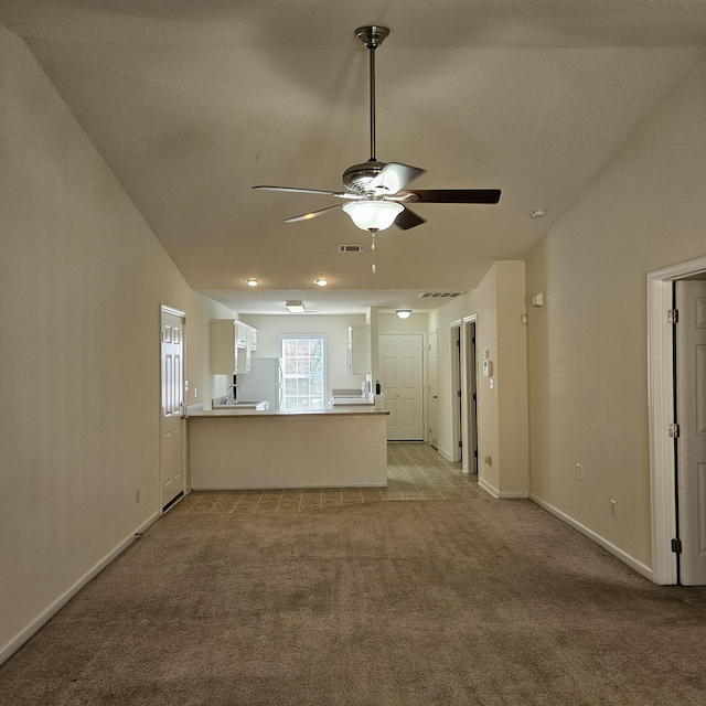 5102 Wheeler Lake Rd, Augusta, GA 30909 - unfurnished living room featuring carpet floors, a ceiling fan, and baseboards