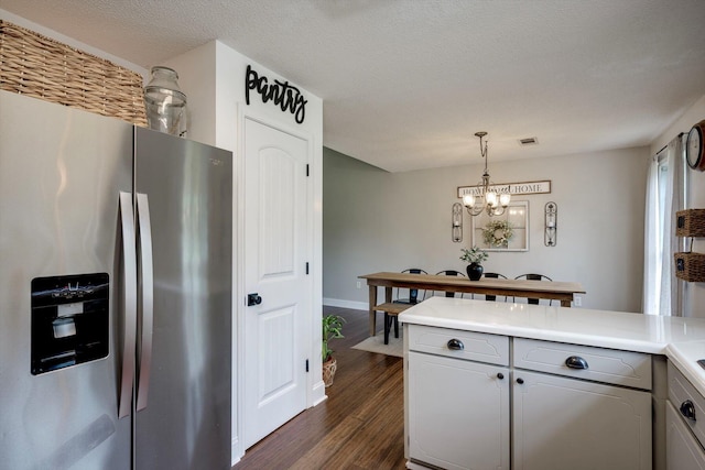 188 Marks Walden Rd, Blythe, GA 30805 - kitchen featuring stainless steel fridge with ice dispenser, dark wood-style floors, a chandelier, light countertops, and gray cabinetry