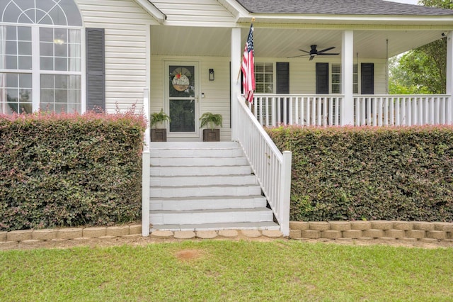 188 Marks Walden Rd, Blythe, GA 30805 - entrance to property with a porch, ceiling fan, a shingled roof, and a yard