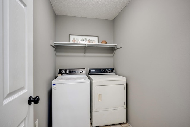 188 Marks Walden Rd, Blythe, GA 30805 - washroom featuring washer and clothes dryer and a textured ceiling