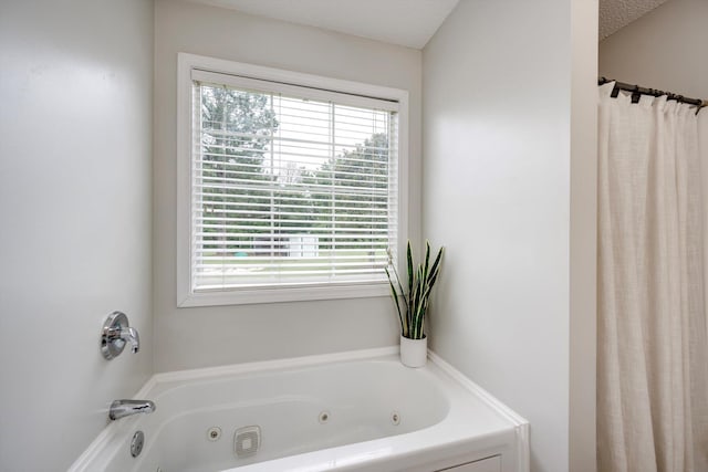 188 Marks Walden Rd, Blythe, GA 30805 - bathroom with a tub with jets and a shower with curtain