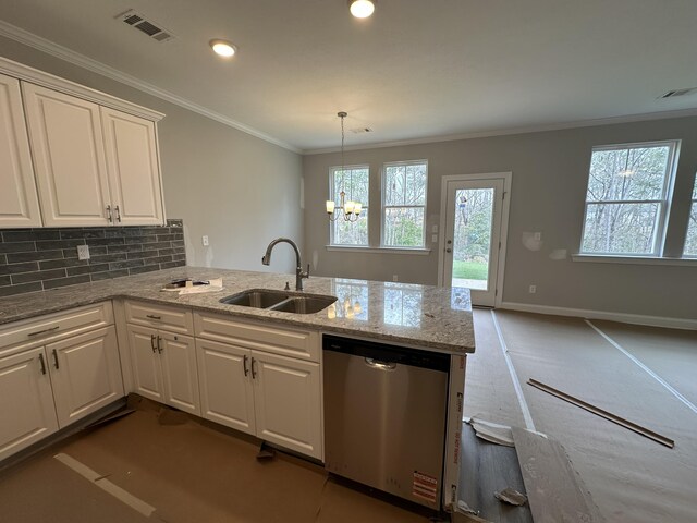 interior space with white cabinets, ceiling fan with notable chandelier, crown molding, and sink