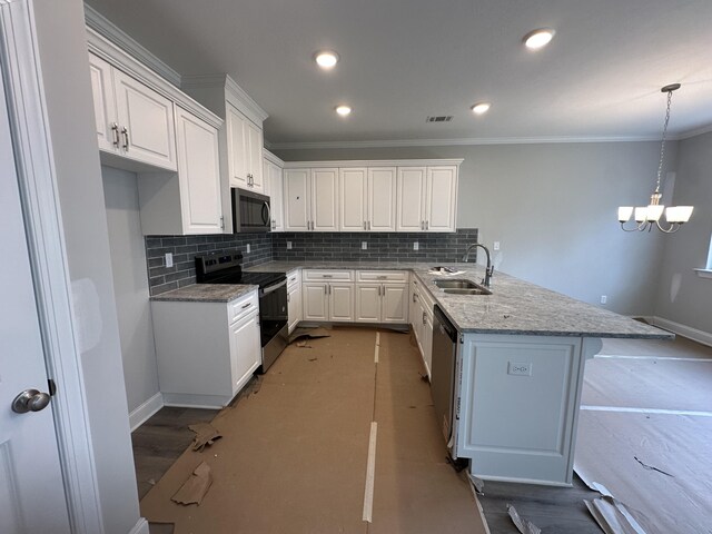 spare room featuring a tray ceiling, ceiling fan, and light colored carpet