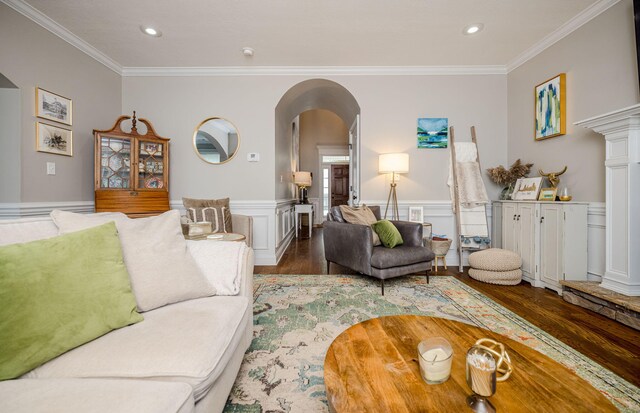 living room featuring crown molding and dark hardwood / wood-style flooring