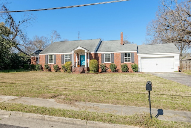 ranch-style home with aphalt driveway, an attached garage, brick siding, and a front lawn