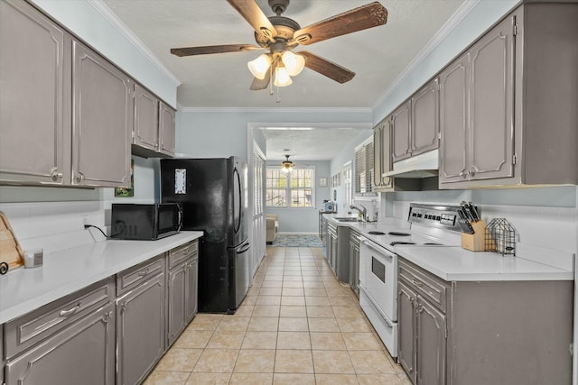 kitchen with black microwave, under cabinet range hood, light tile patterned floors, white electric stove, and a ceiling fan