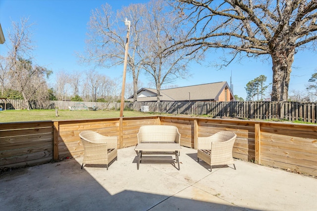 view of patio featuring a fenced backyard