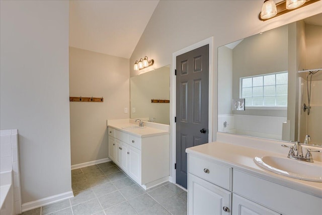 5776 Carriage Hills Dr, Martinez, GA 30907 - bathroom featuring lofted ceiling, a bath, vanity, and tile patterned floors