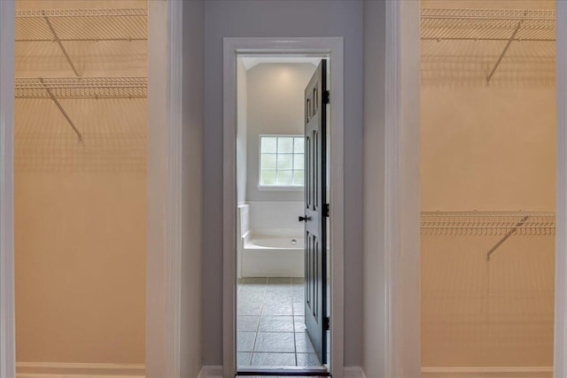 5776 Carriage Hills Dr, Martinez, GA 30907 - spacious closet featuring tile patterned flooring