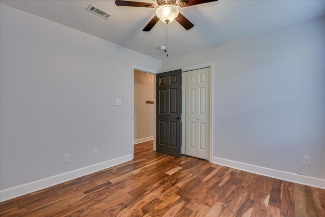 5776 Carriage Hills Dr, Martinez, GA 30907 - unfurnished bedroom with wood finished floors, a closet, and a ceiling fan