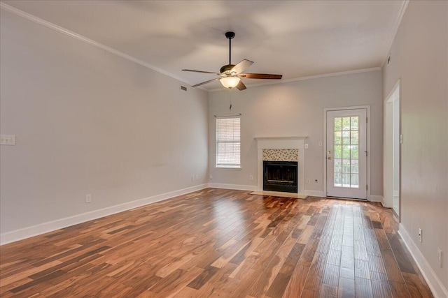5776 Carriage Hills Dr, Martinez, GA 30907 - unfurnished living room with ceiling fan, wood finished floors, ornamental molding, and a fireplace