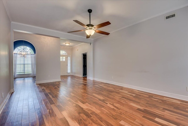 5776 Carriage Hills Dr, Martinez, GA 30907 - empty room featuring wood finished floors, a ceiling fan, ornamental molding, and a chandelier