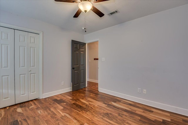 5776 Carriage Hills Dr, Martinez, GA 30907 - unfurnished bedroom featuring wood finished floors, a closet, and a ceiling fan
