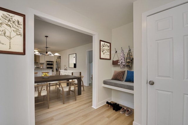 3408 Wheeler Rd, Augusta, GA 30909 - corridor featuring light wood-type flooring, baseboards, and arched walkways