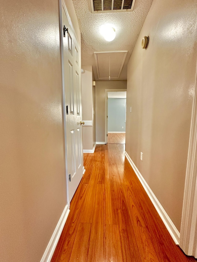 unfurnished sunroom with a wall mounted air conditioner and ceiling fan