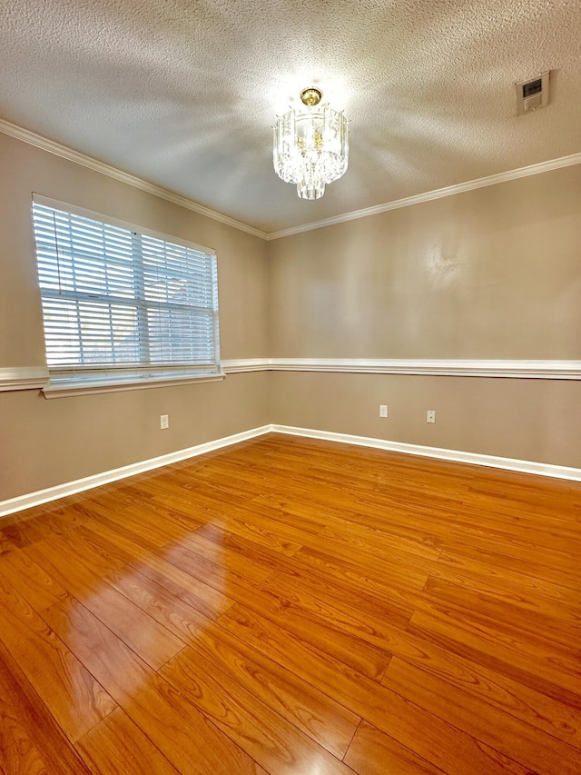 interior space featuring ceiling fan, light wood-type flooring, and a textured ceiling