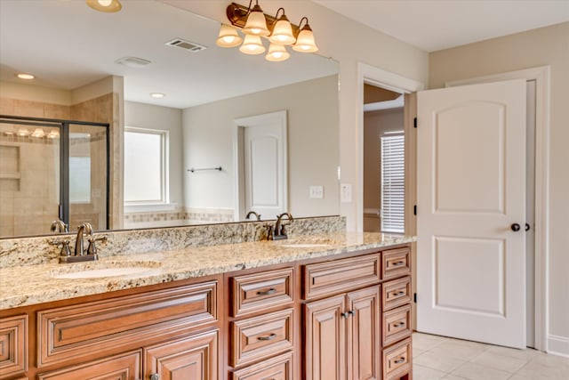 514 Hardwick Ct, Evans, GA 30809 - bathroom with double vanity, a shower stall, tile patterned flooring, and a chandelier