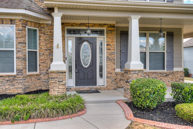 514 Hardwick Ct, Evans, GA 30809 - doorway to property with covered porch and stone siding