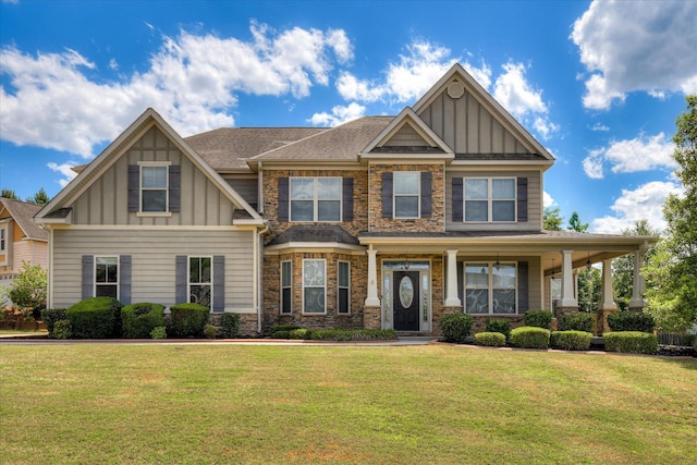 514 Hardwick Ct, Evans, GA 30809 - craftsman-style house with board and batten siding, a front lawn, and stone siding