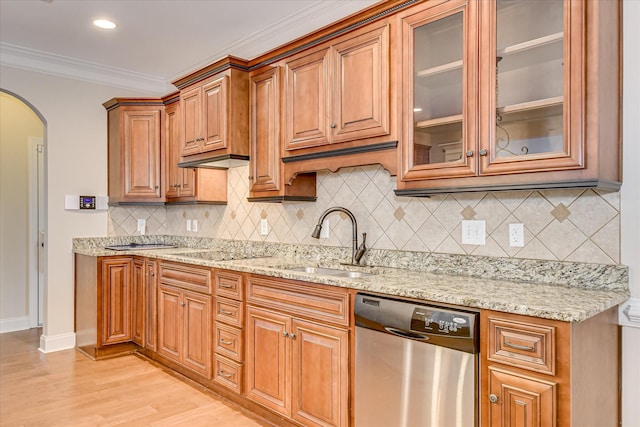 514 Hardwick Ct, Evans, GA 30809 - kitchen with dishwasher, a sink, arched walkways, light stone countertops, and crown molding