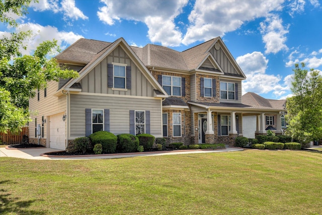 514 Hardwick Ct, Evans, GA 30809 - craftsman-style house with board and batten siding, driveway, stone siding, and a front yard