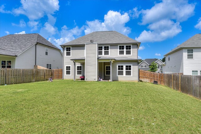 3015 Bannack Ln, Harlem, GA 30814 - rear view of property with a fenced backyard and a shingled roof