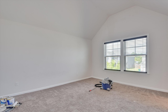 3015 Bannack Ln, Harlem, GA 30814 - carpeted empty room featuring vaulted ceiling and baseboards
