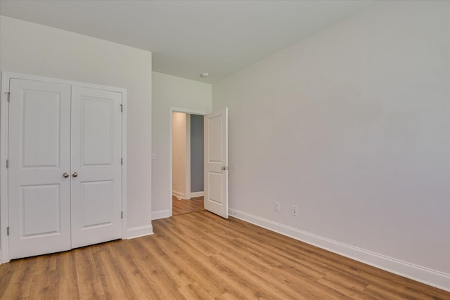 3015 Bannack Ln, Harlem, GA 30814 - unfurnished bedroom featuring light wood-type flooring and a closet