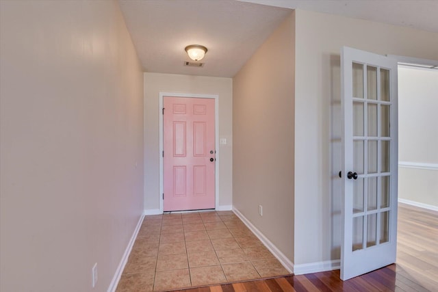 doorway to outside featuring light hardwood / wood-style flooring