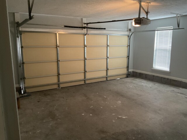 1129 Waltons Trl, Hephzibah, GA 30815 - garage featuring a garage door opener