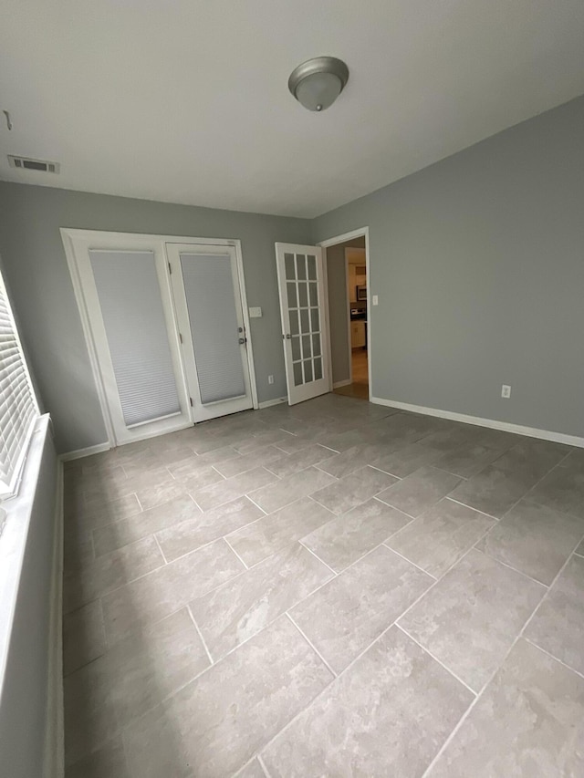 1129 Waltons Trl, Hephzibah, GA 30815 - unfurnished room featuring baseboards and light tile patterned floors